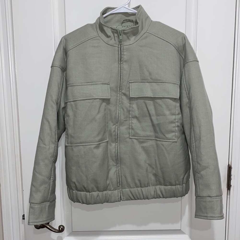 Light green zip up jacket size medium